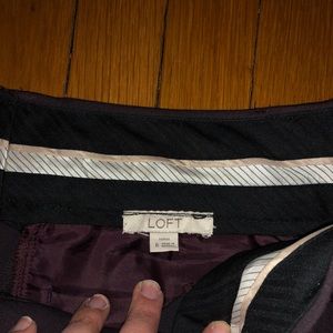 Dark purple trousers